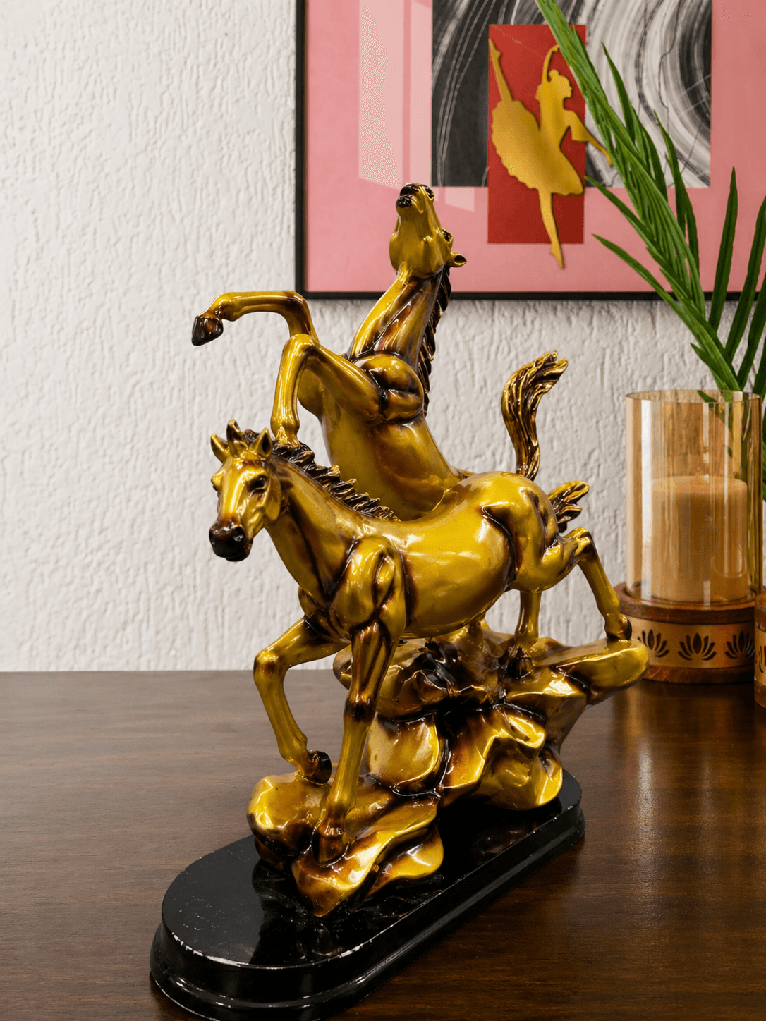 Premium golden double rearing horse statue showpiece on a wooden table for living room decor